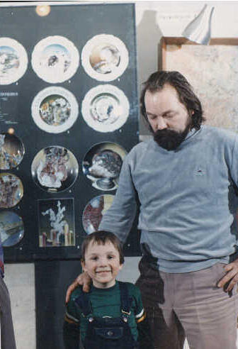 Son Vasilij near stand on the exhibition.Leningrad 1985.